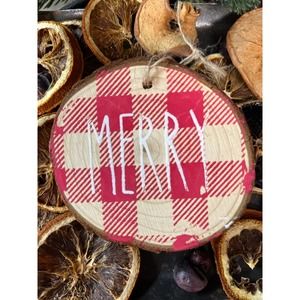 Merry hand painted wooden ornament with red plaid background